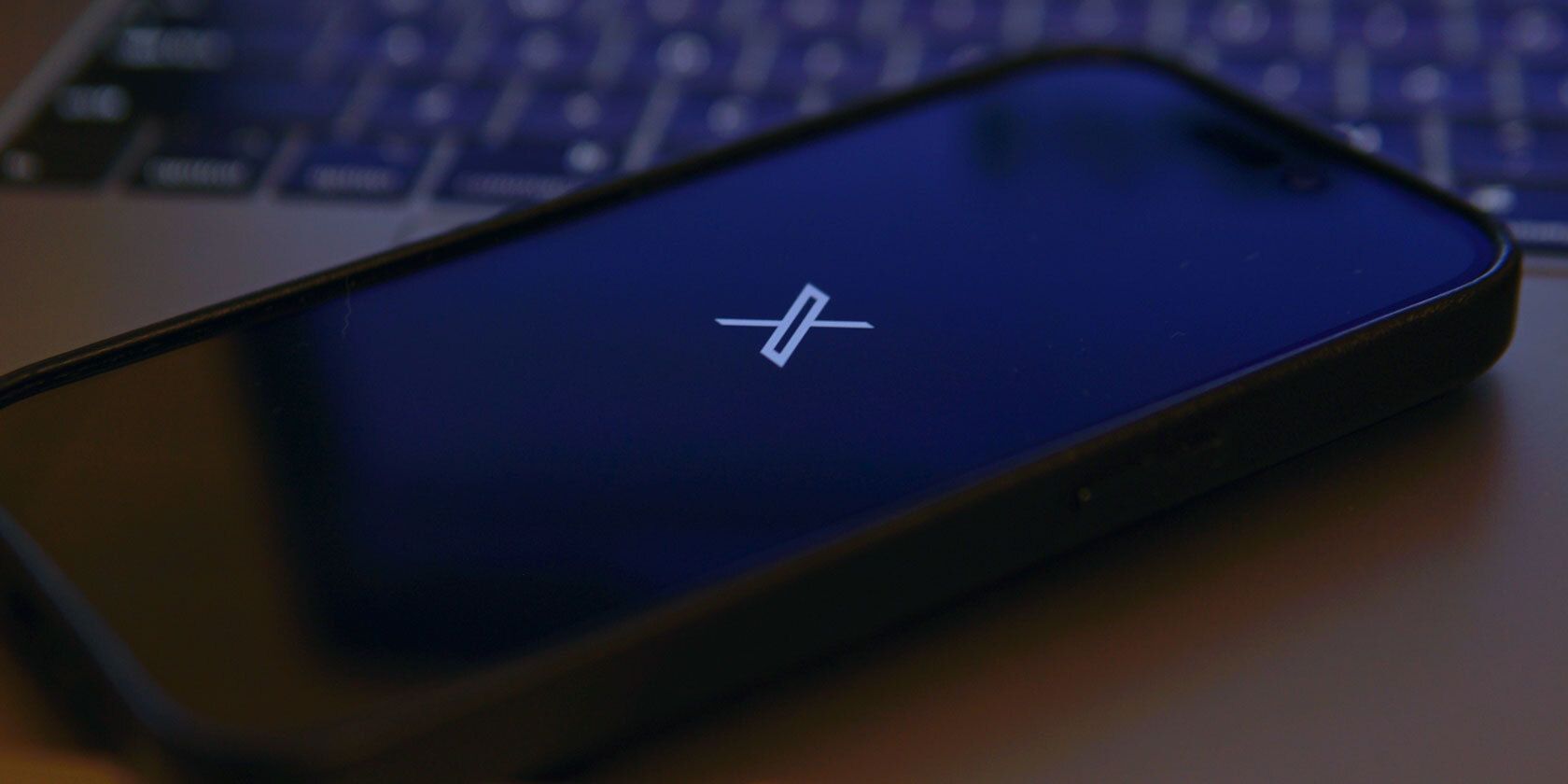 x twitter logo on an iphone