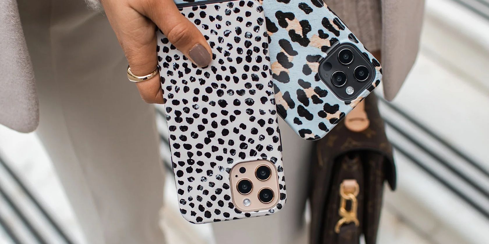 burga phone cases being held in woman's hand