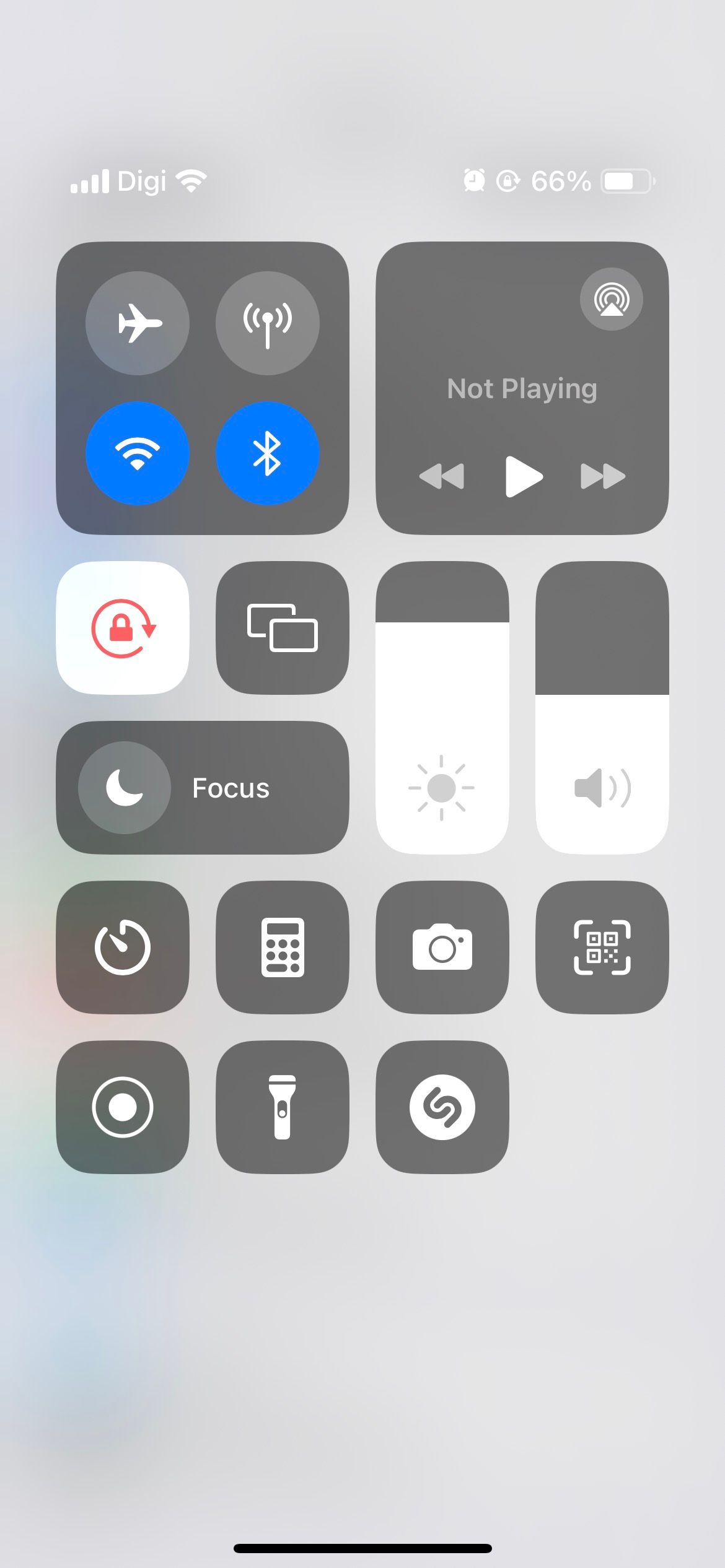 iphone control center showing high screen brightness