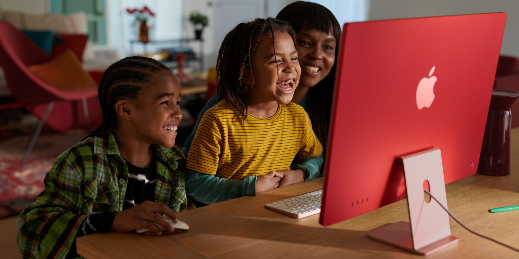 kids using M3 iMac on a desk