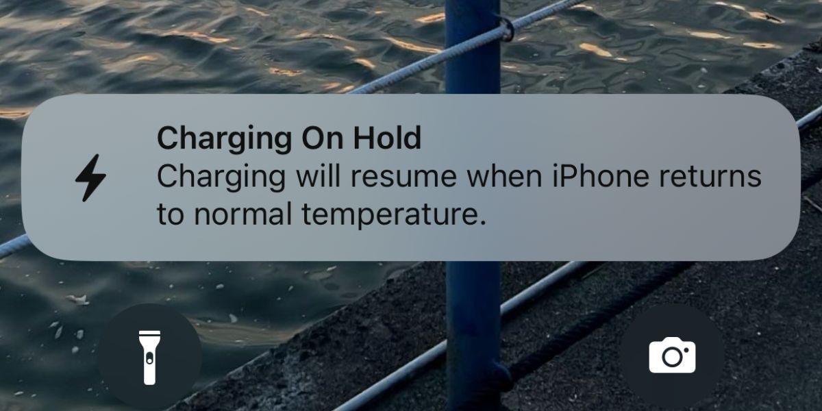 iphone message saying charging on hold 