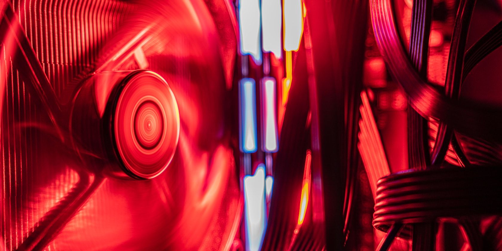 a fan glows and spins inside a pc
