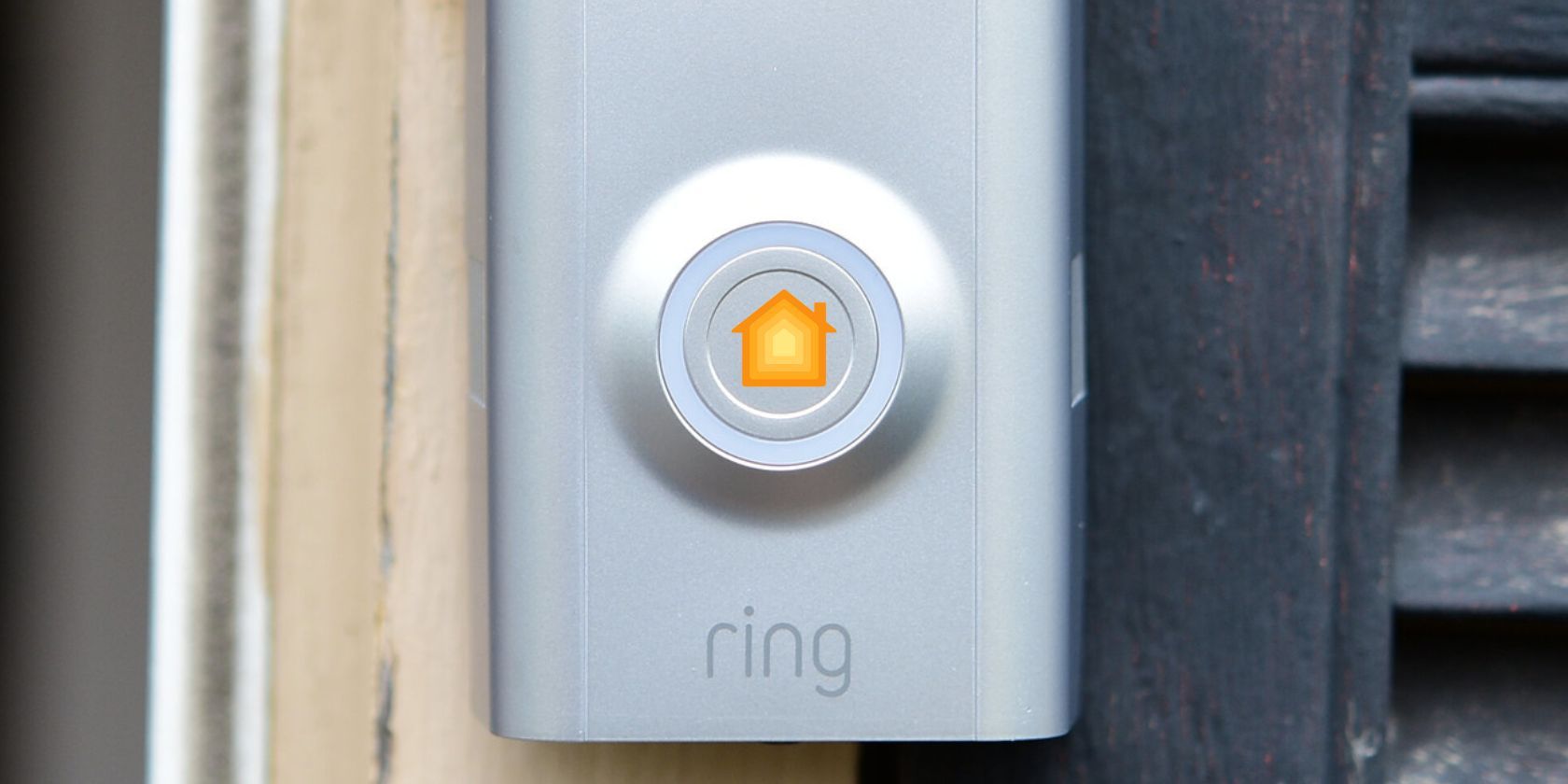 ring doorbell with apple homekit symbol on bell button