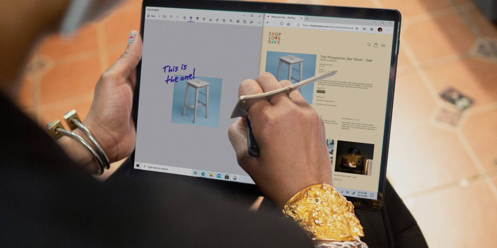 A person Using a Windows 11 2-in-1 With a Pen