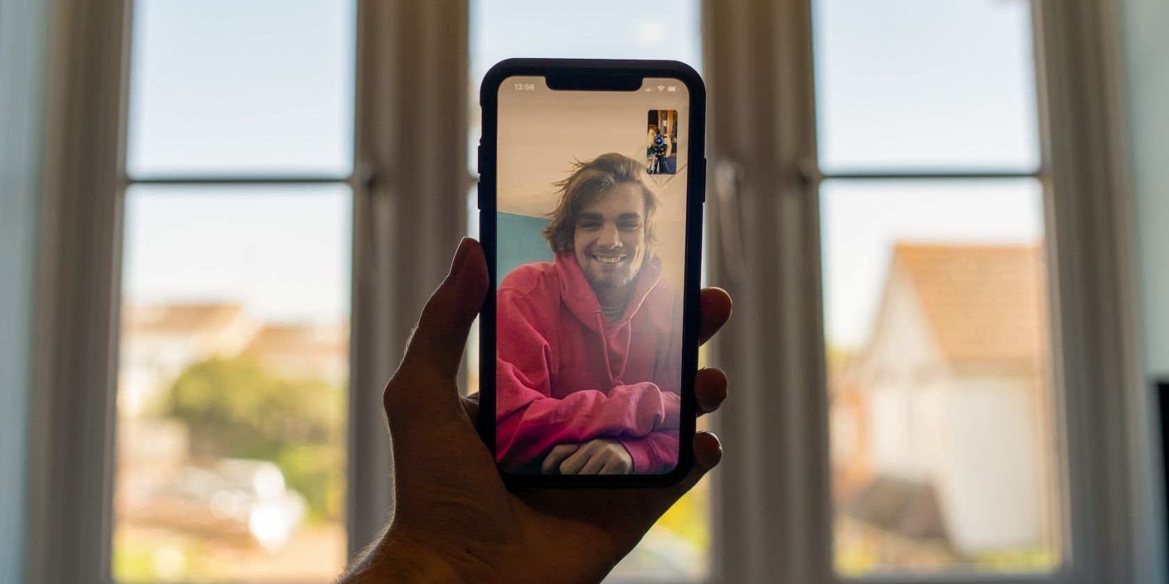 person using FaceTime on their iPhone