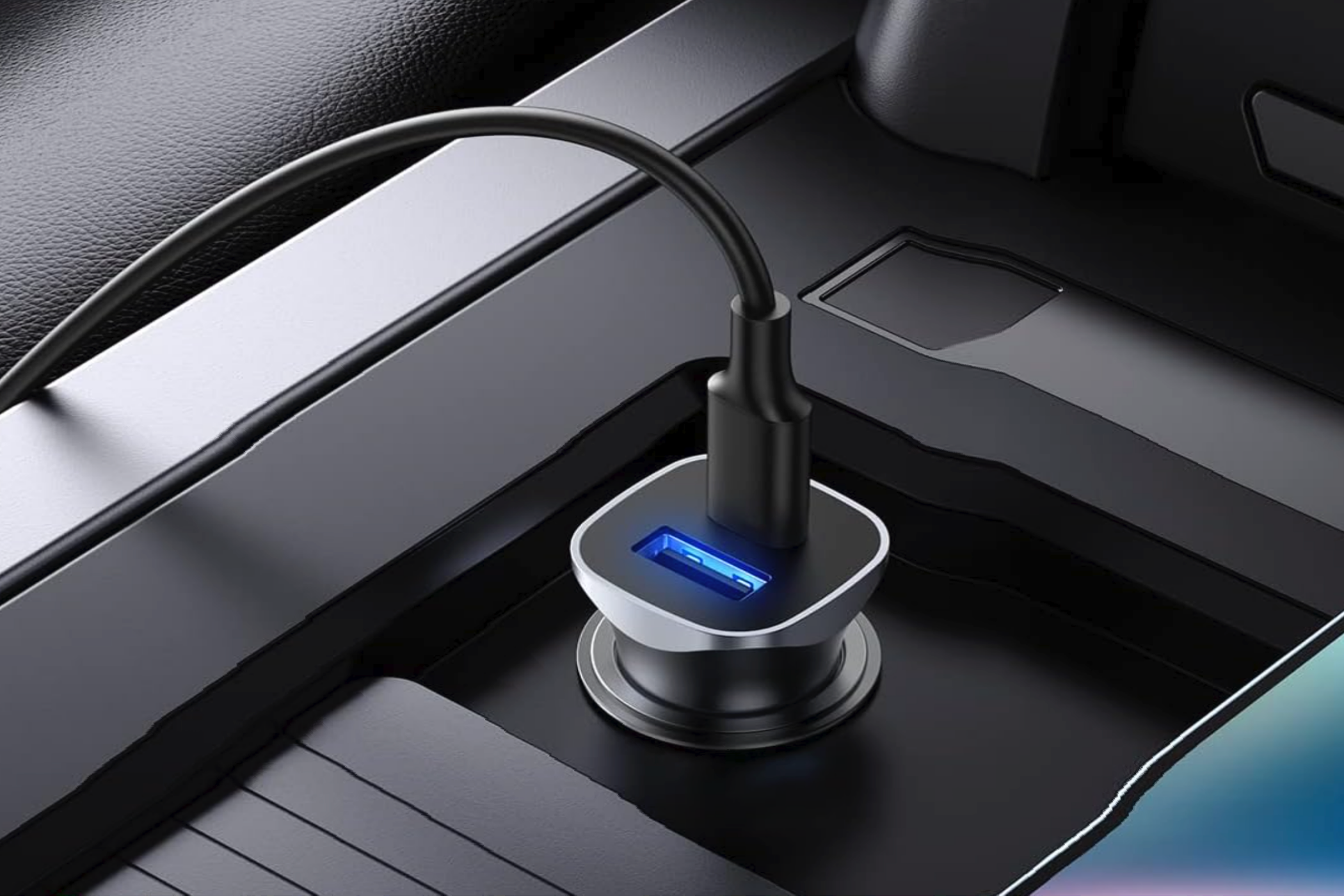 A UGREEN USB Car Charger connected to a car power outlet with a cable connected to USB-C port.
