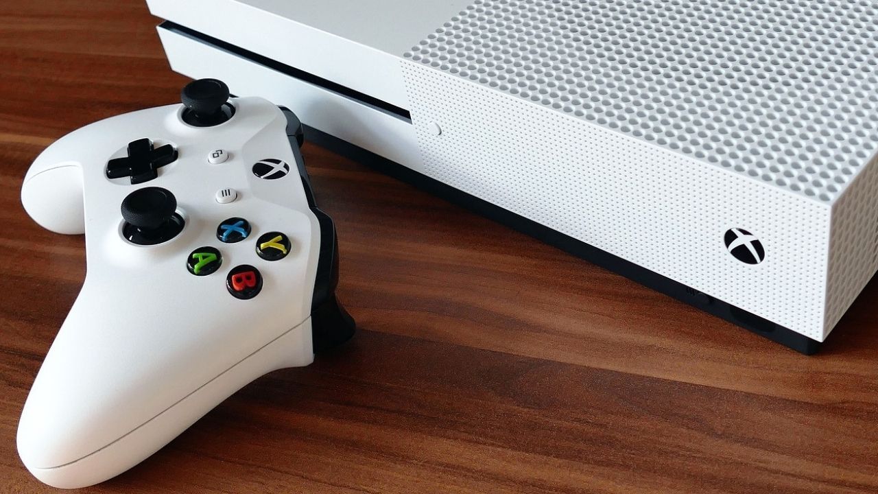 White Xbox Series S and Controller on Table 