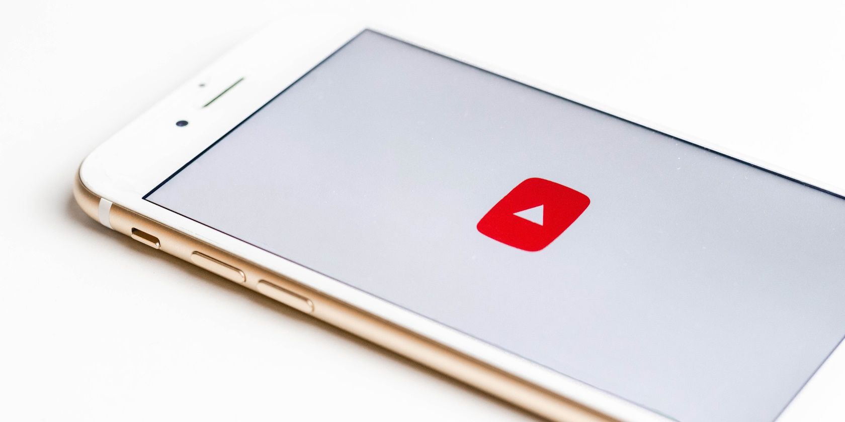 youtube logo on white smartphone screen