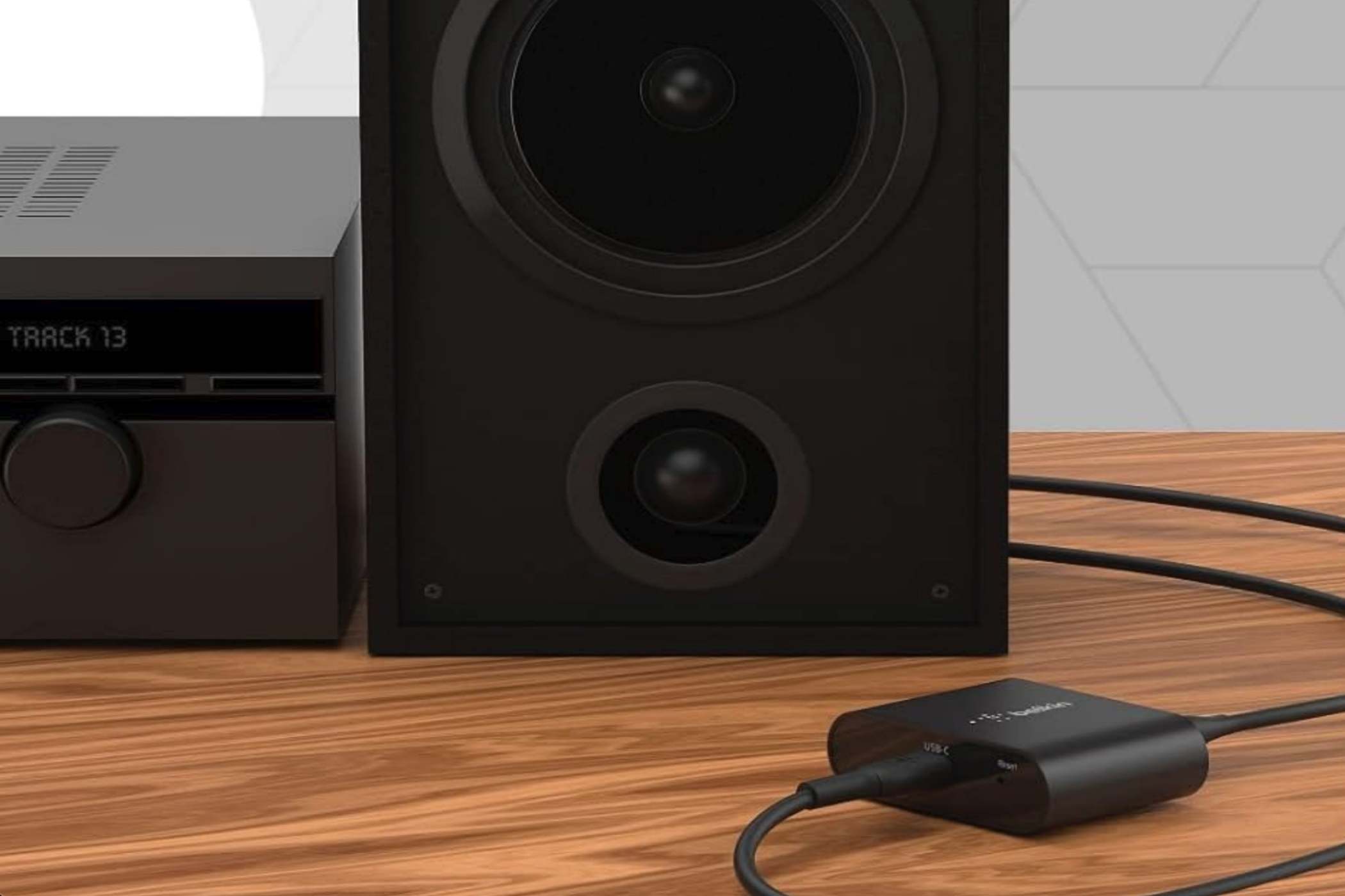 A Belkin SoundForm Connect AirPlay 2 next to a speaker