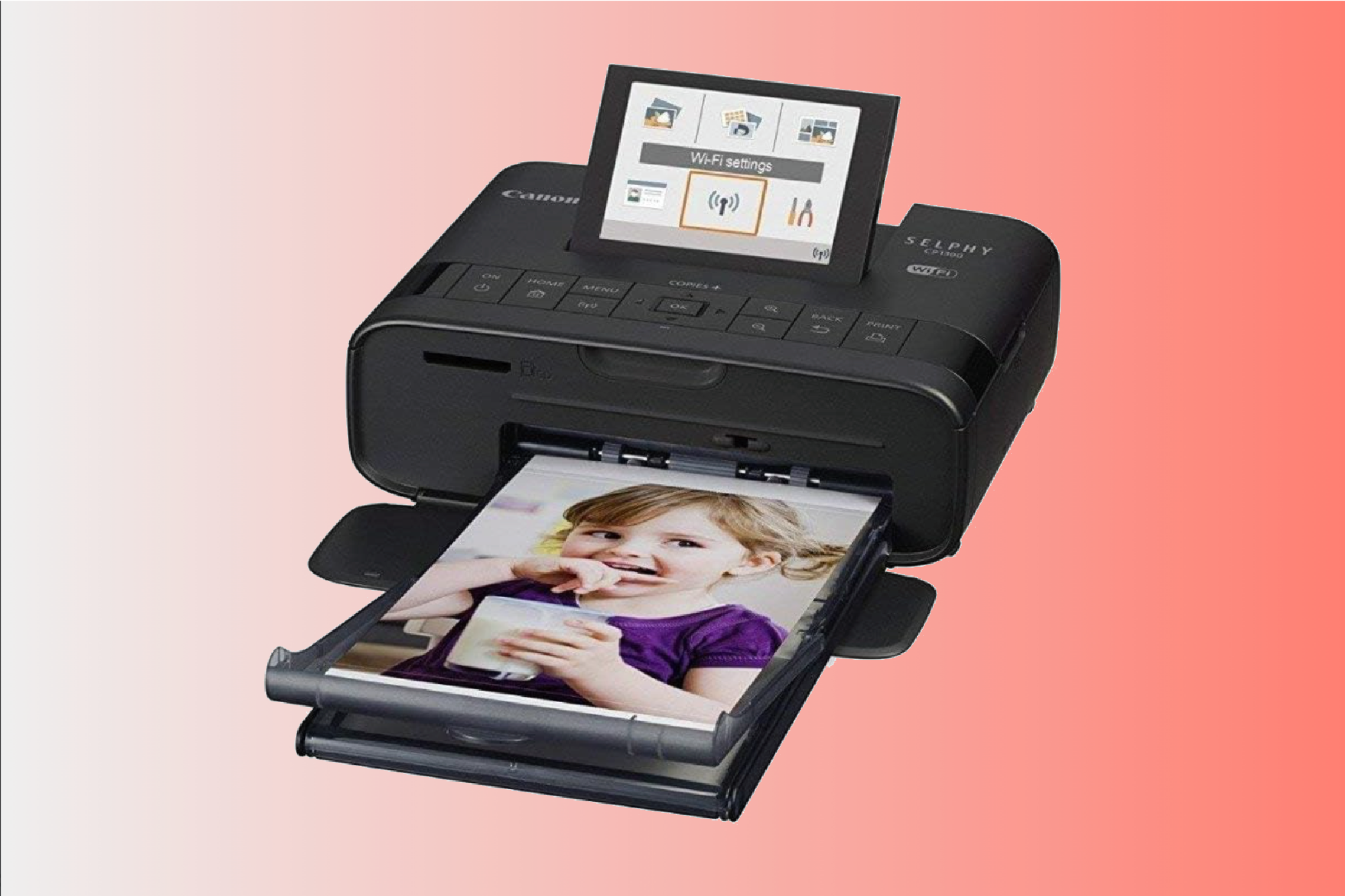 A Canon Selphy CP1300 printing a picture of a chlld
