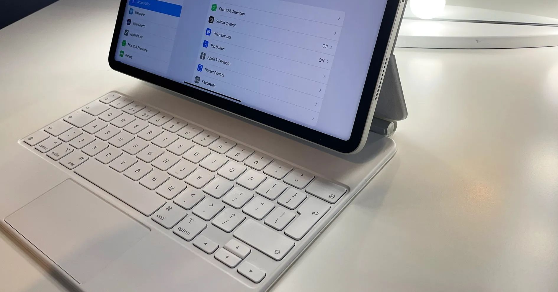 iPad Pro connected to a white Magic Keyboard