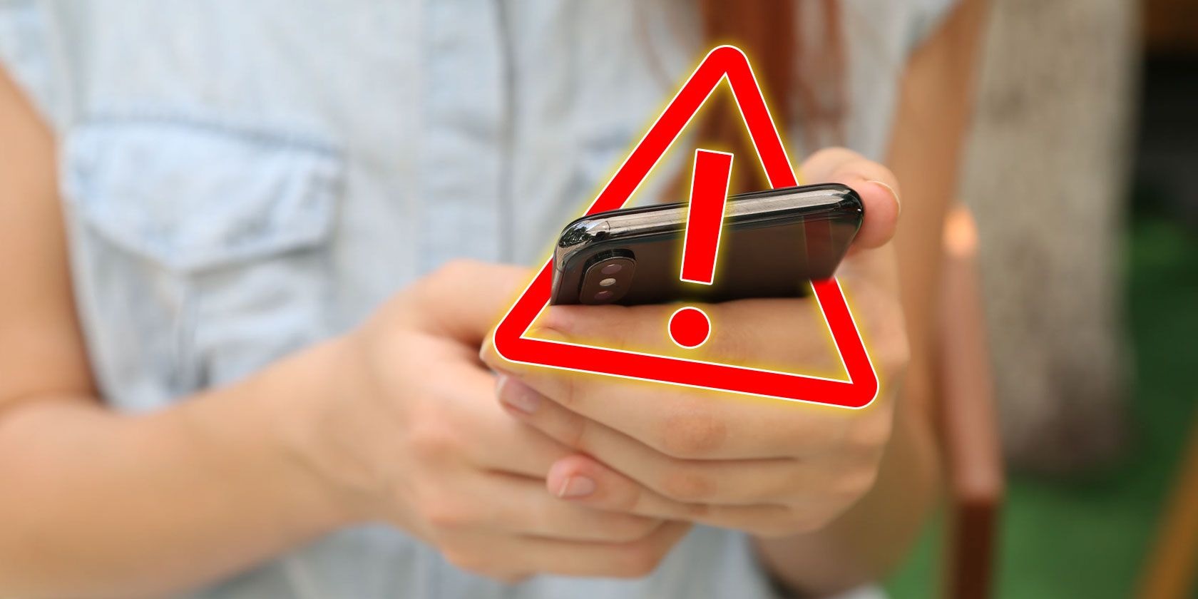 Warning Sign around a smartphone