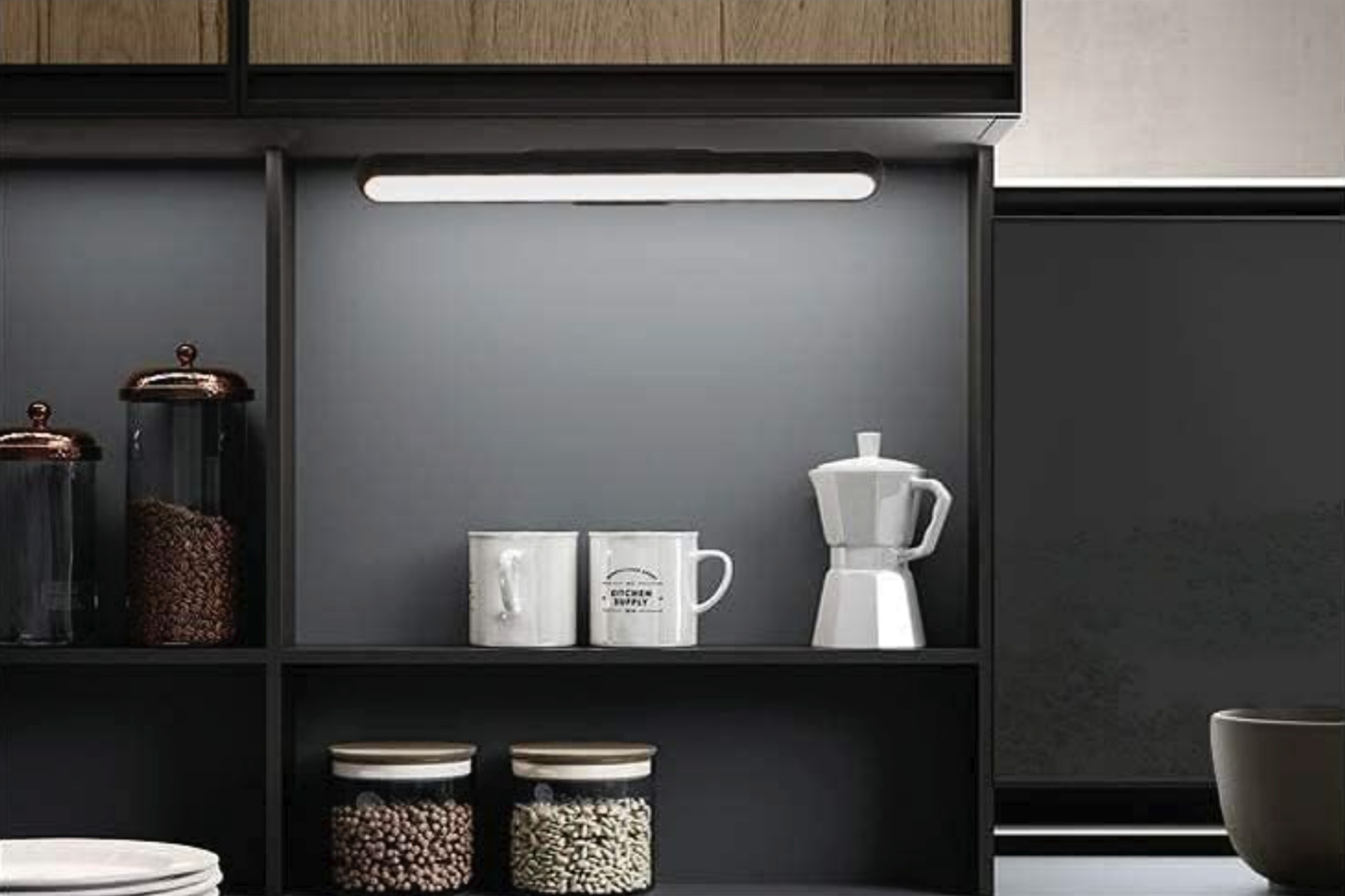 A WILLED Light Bar being used in a kitchen cabinet