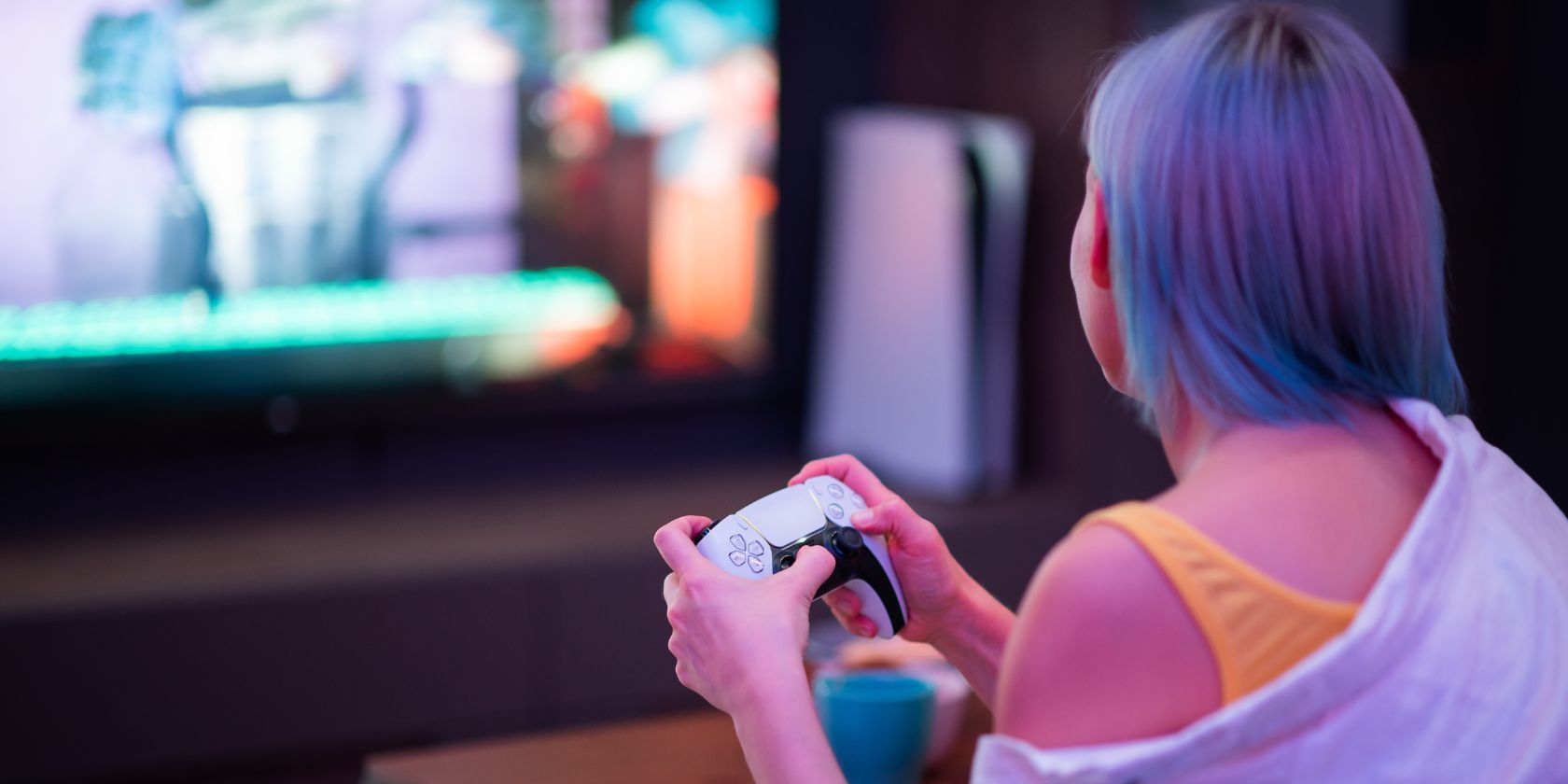 a woman playing games on a ps5 console