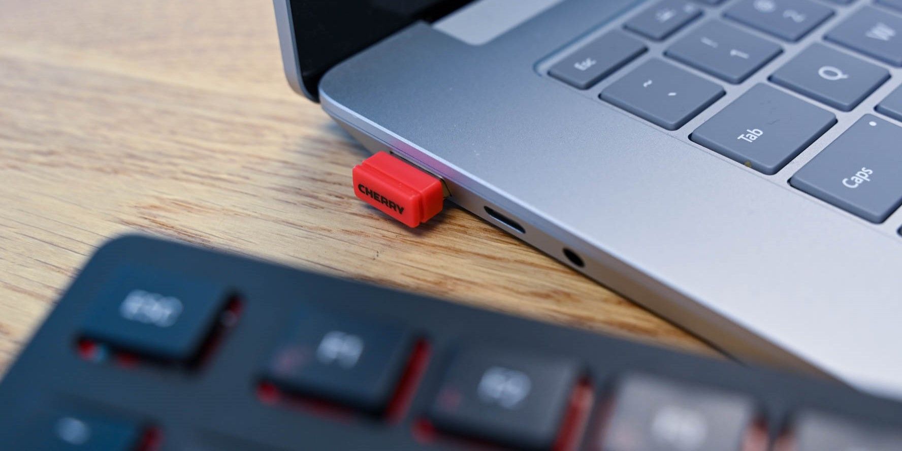 Cherry KW 9200 Mini Keyboard Bluetooth dongle in a laptop