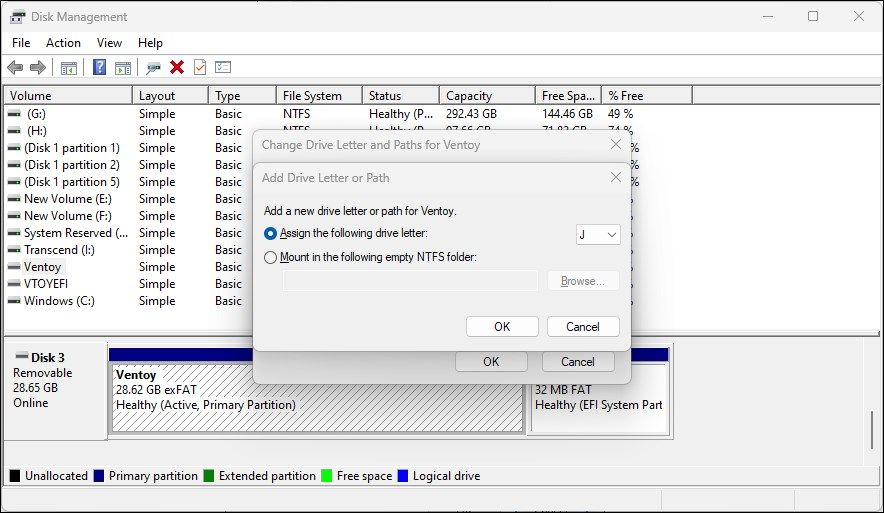 Утилита управления дисками показывает параметр "Назначить следующую букву диска"