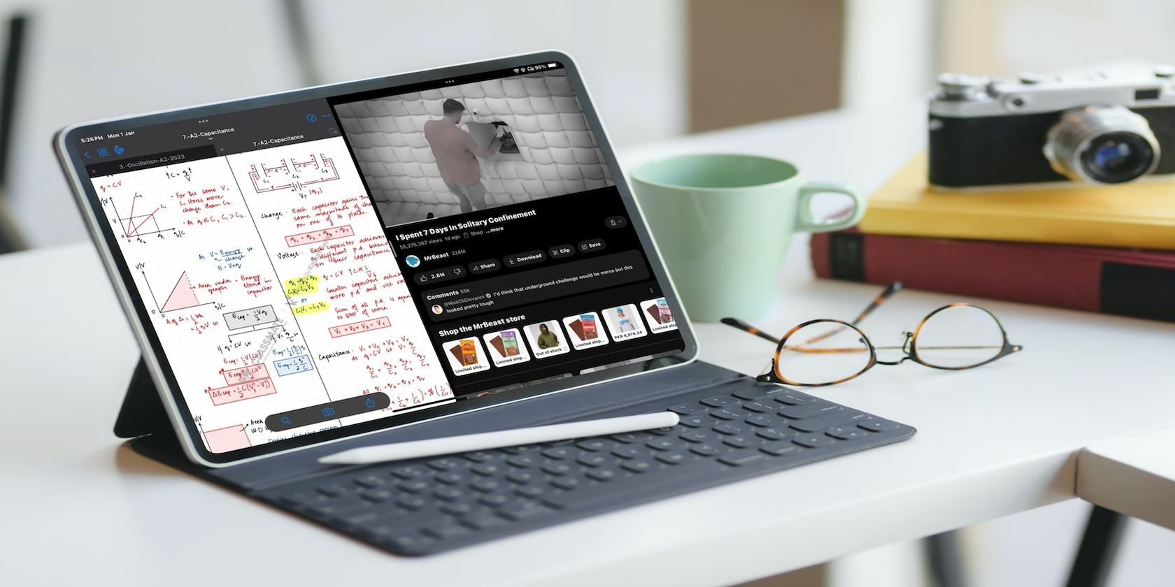 iPad Pro with split view of physics notes and YouTube video on screen 
