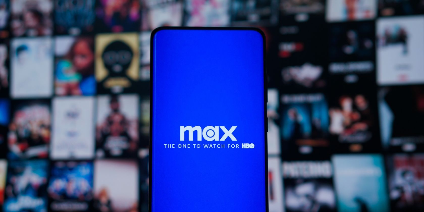 max logo on smartphone in front of a tv screen