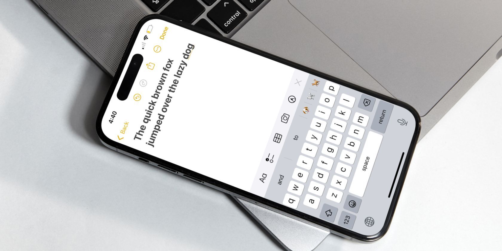 iphone notes app showing on screen keyboard