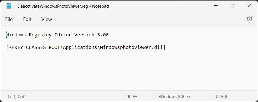 Notepad App Showing a Registry Script to Disable Windows Photo Viewer in Windows 11 