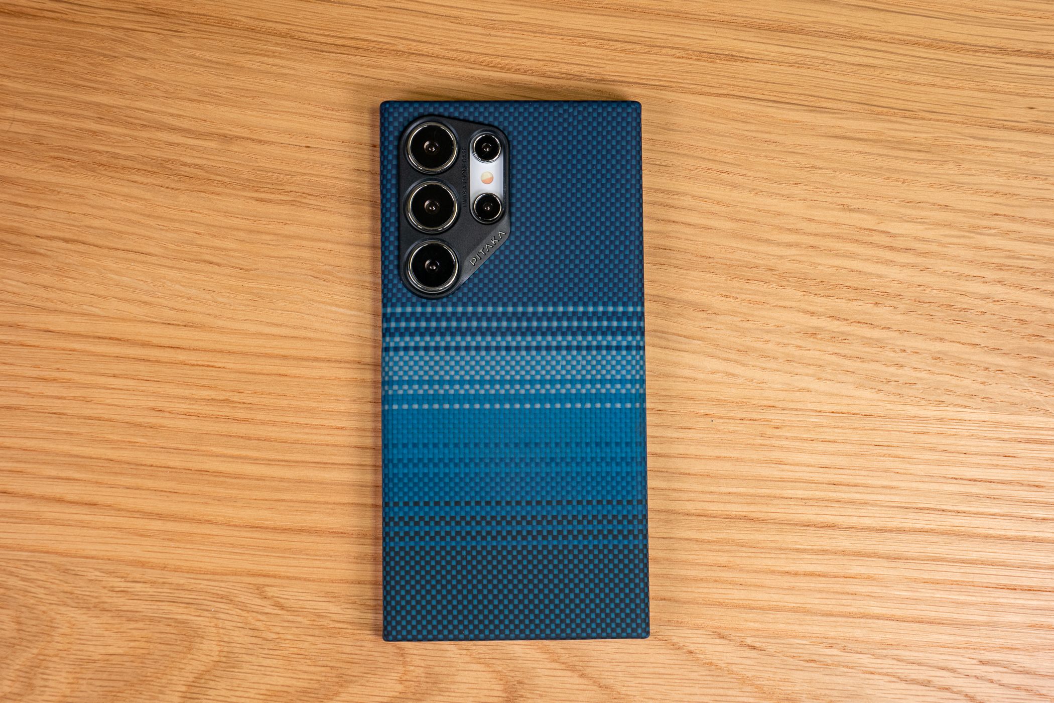 A textured blue Pitaka Galaxy S24 Ultra case