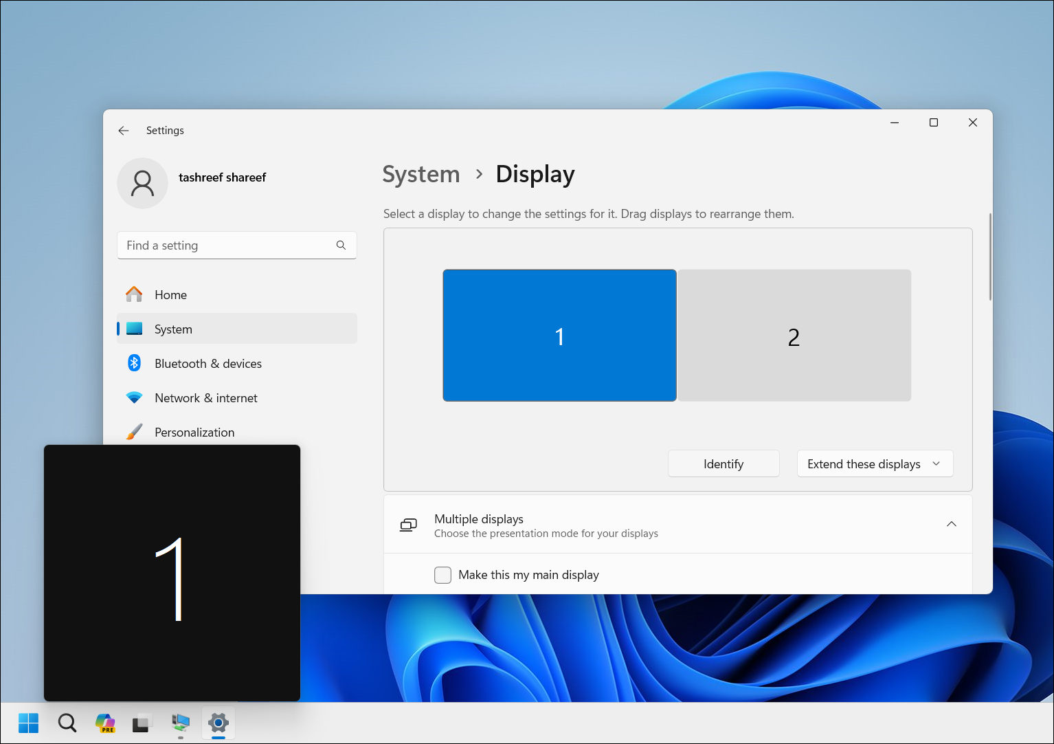 Приложение "Настройки Windows 11" Показывает опцию "Идентифицировать дисплей" с пронумерованным полем на экране