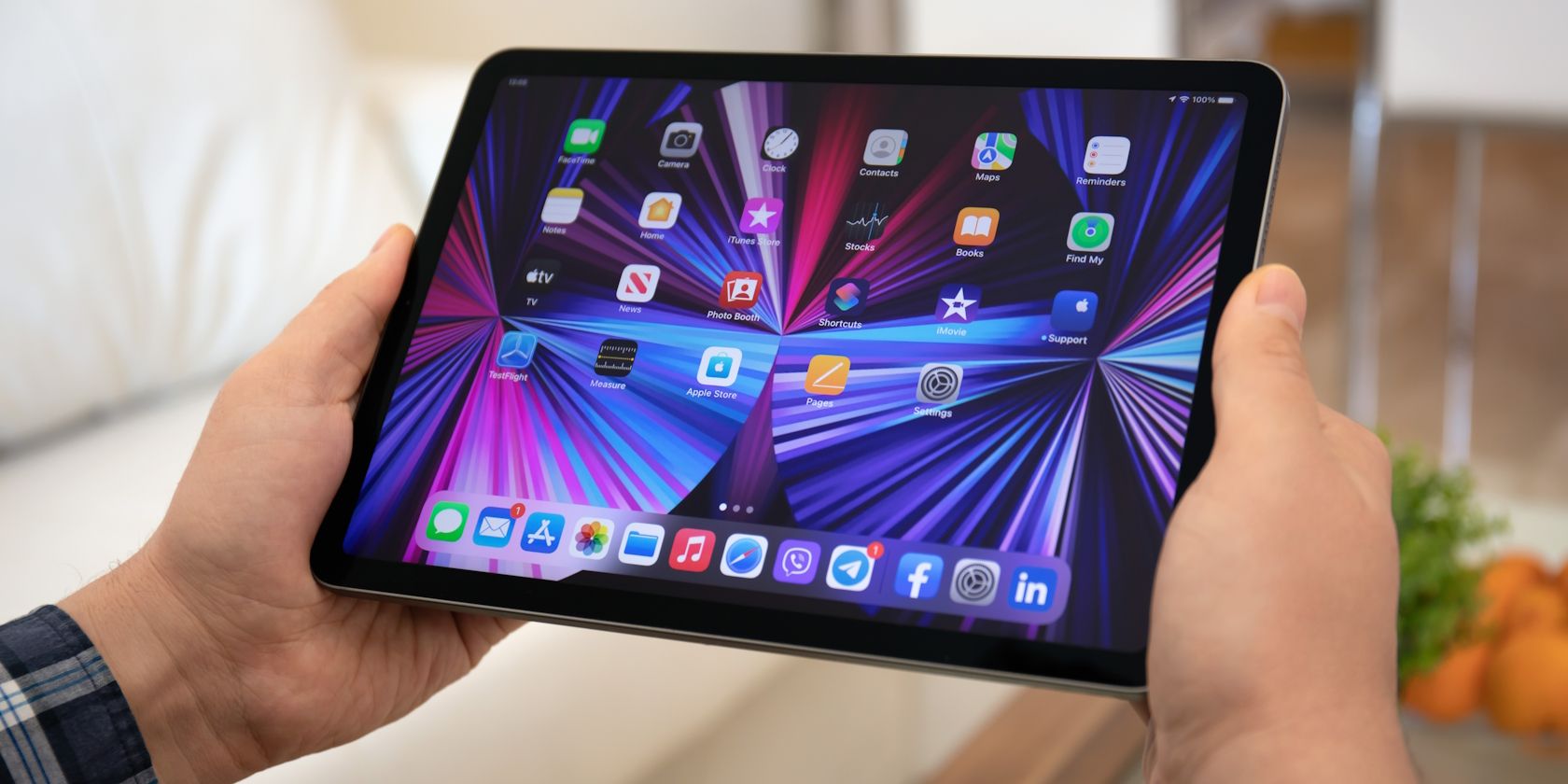 A man holding an 11-inch iPad Pro