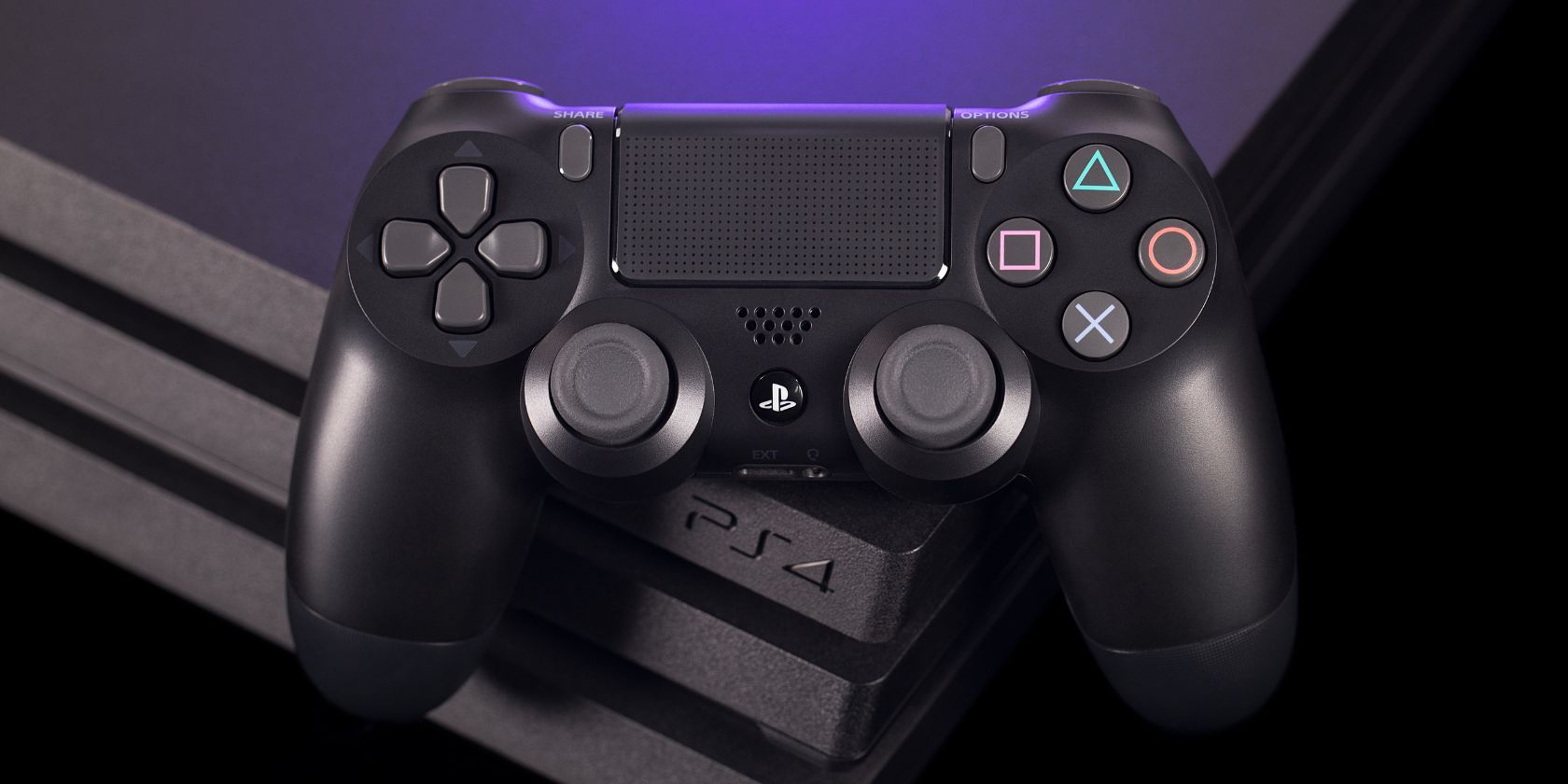 a ps4 pro console with its controller