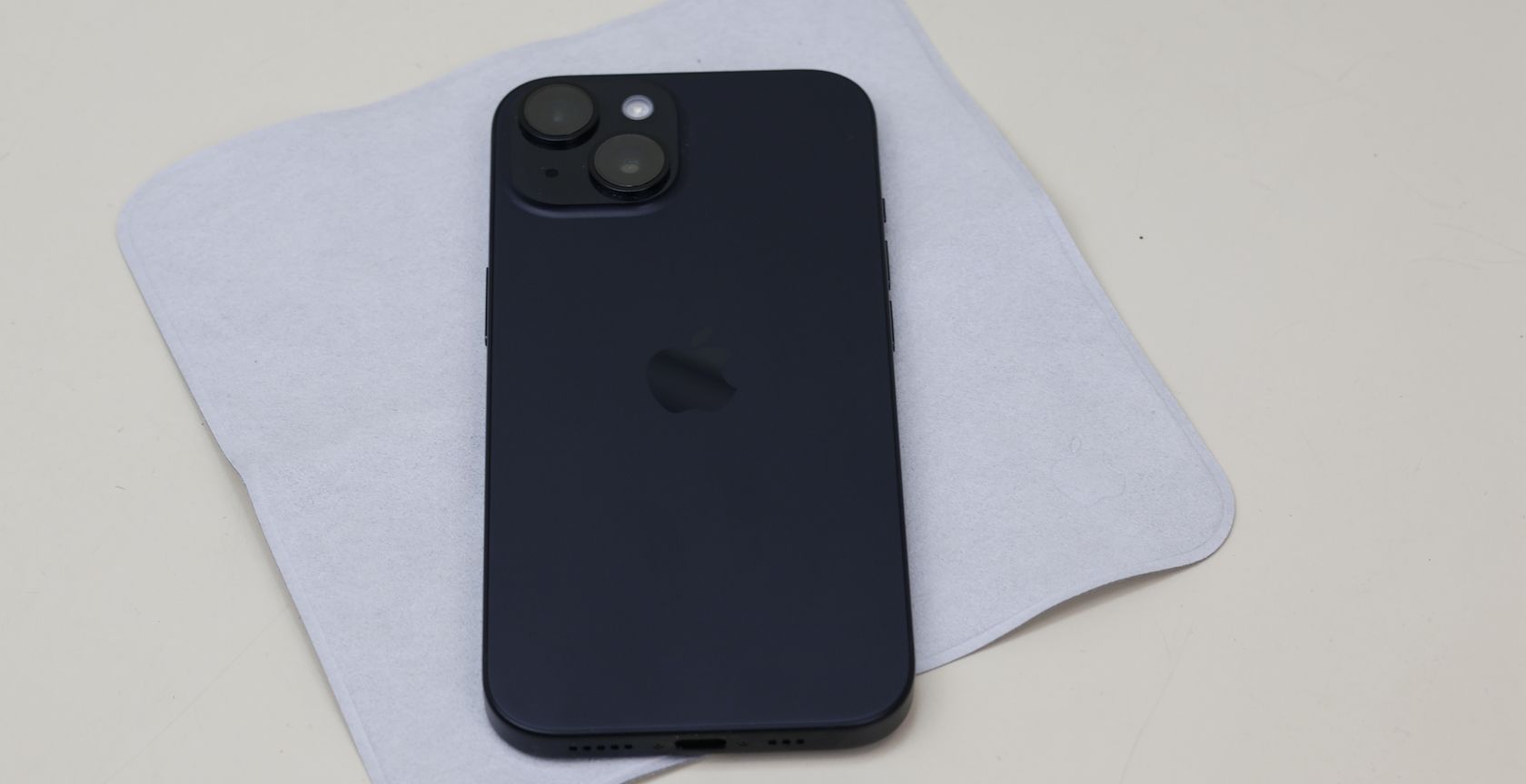 iPhone 12 on top of a lint-free cloth