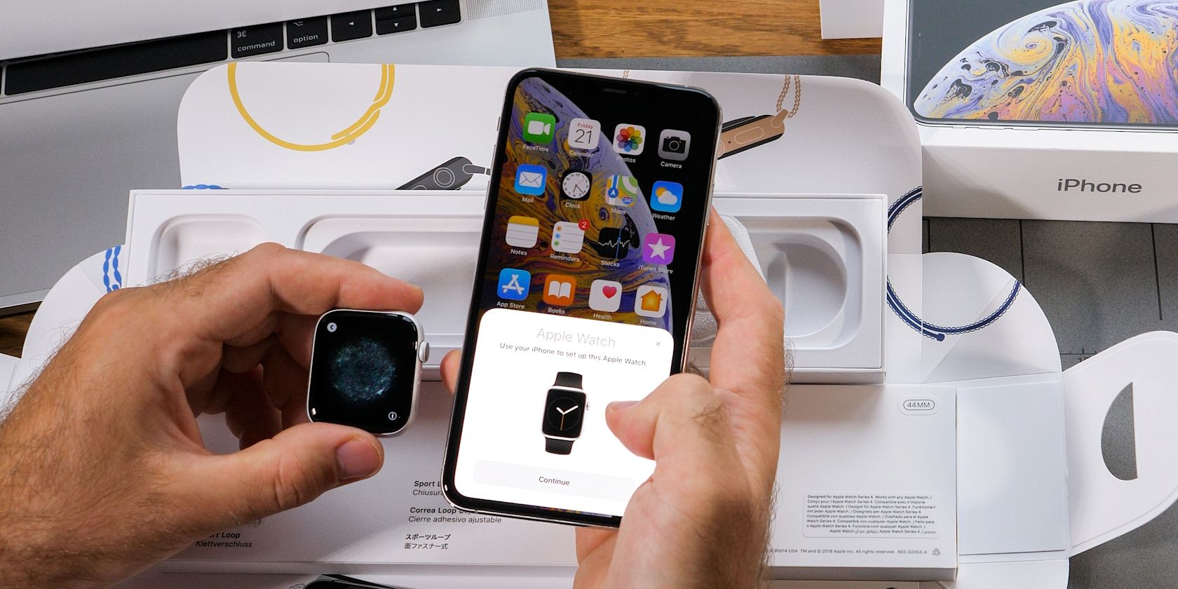 A man trying to pair an Apple Watch with an iPhone