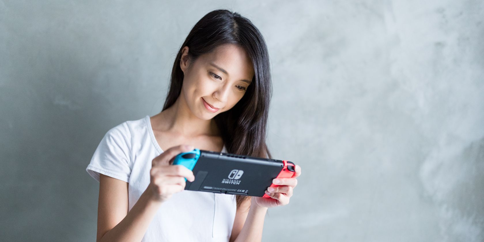 a woman playing games on an nintendo switch
