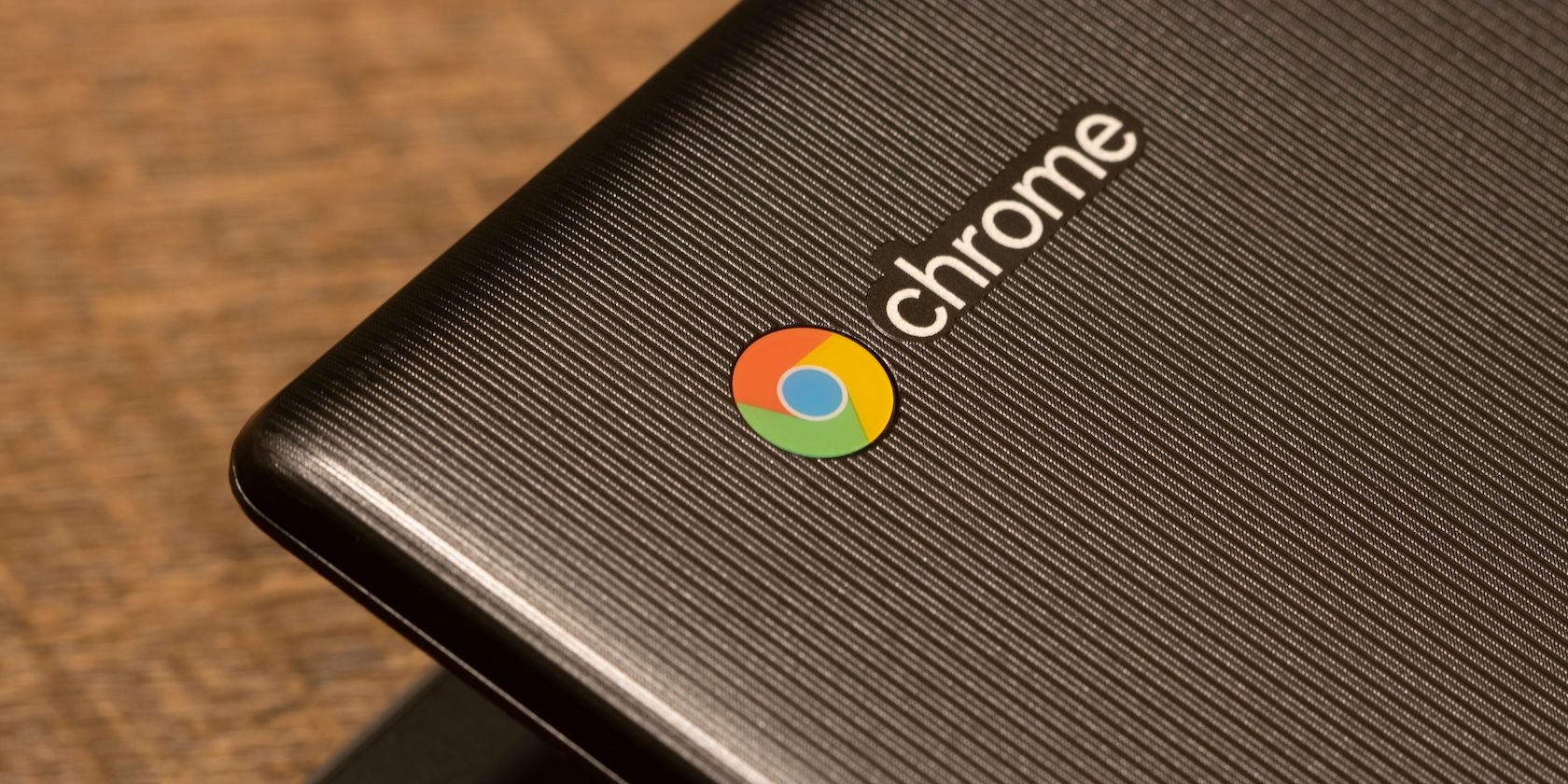 The lid of a Chromebook with a prominent chrome logo in red, blue, green, and yellow