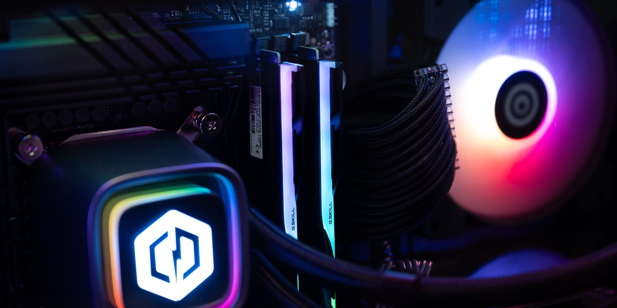 RGB pc fan, CPU cooler, and RAM inside a gaming computer