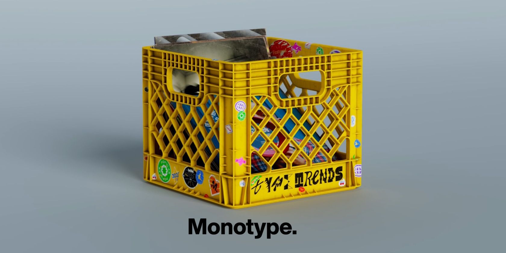 yellow plastic box with writing below saying monotype