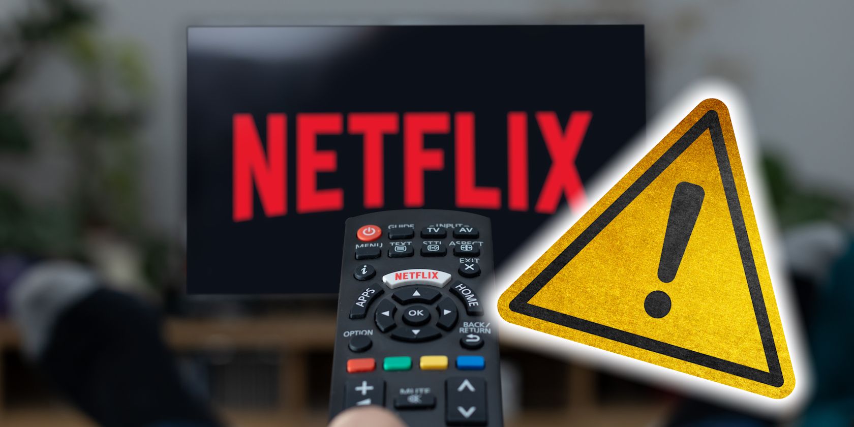 netflix logo on tv screen with yellow error warning symbol