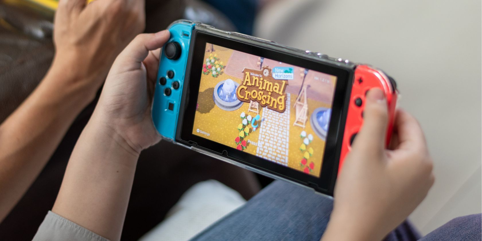 a person playing animal crossing on a nintendo switch