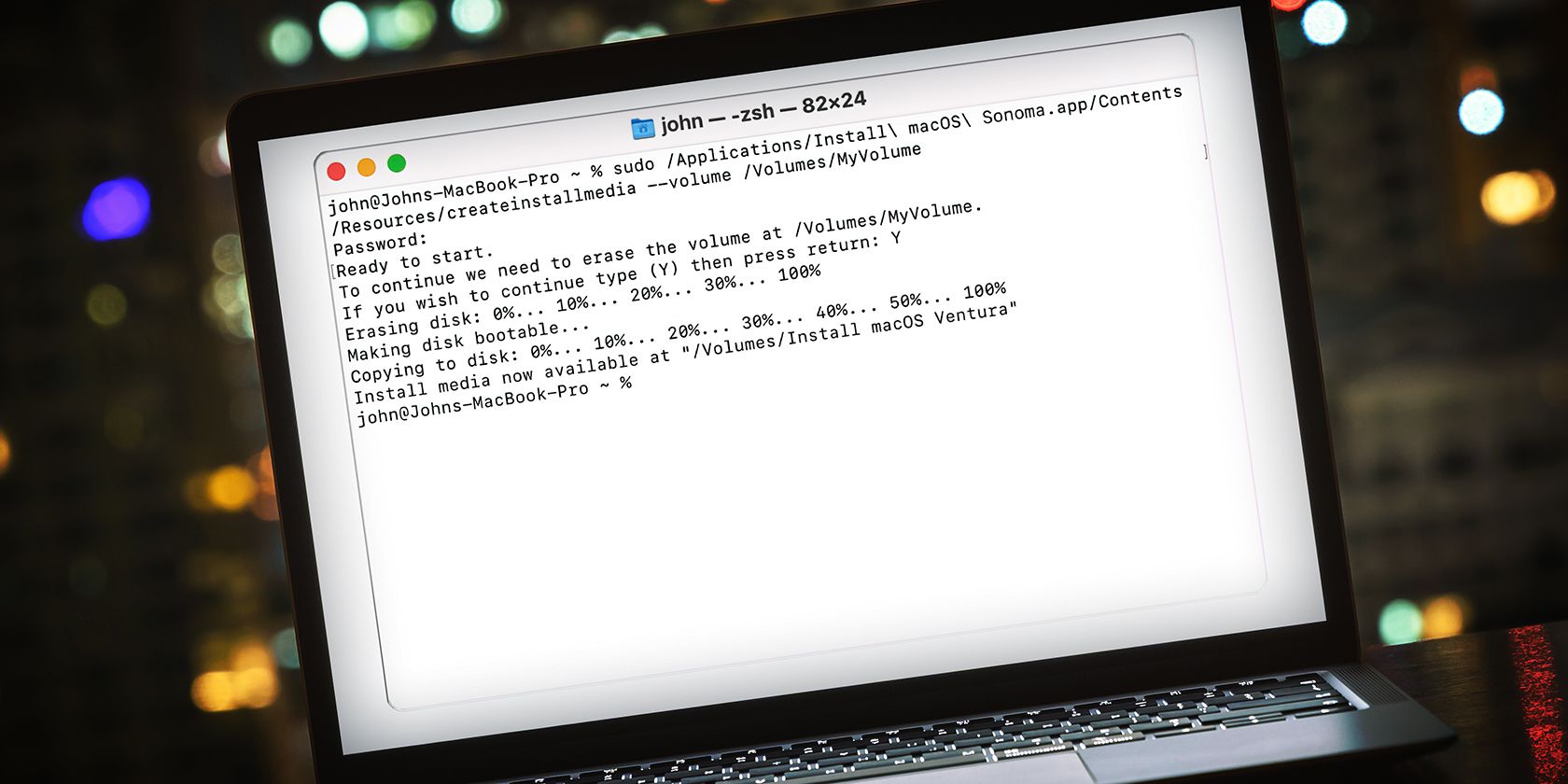 A MacBook with terminal open showing commands to create a bootable macOS install media.