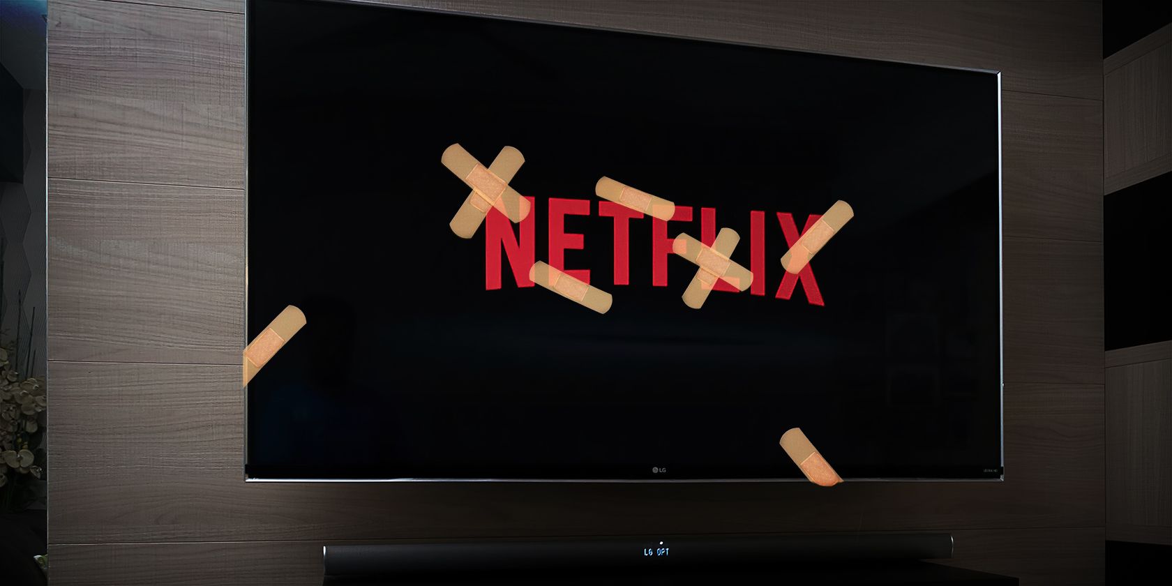 netflix logo on screen with sticking plasters