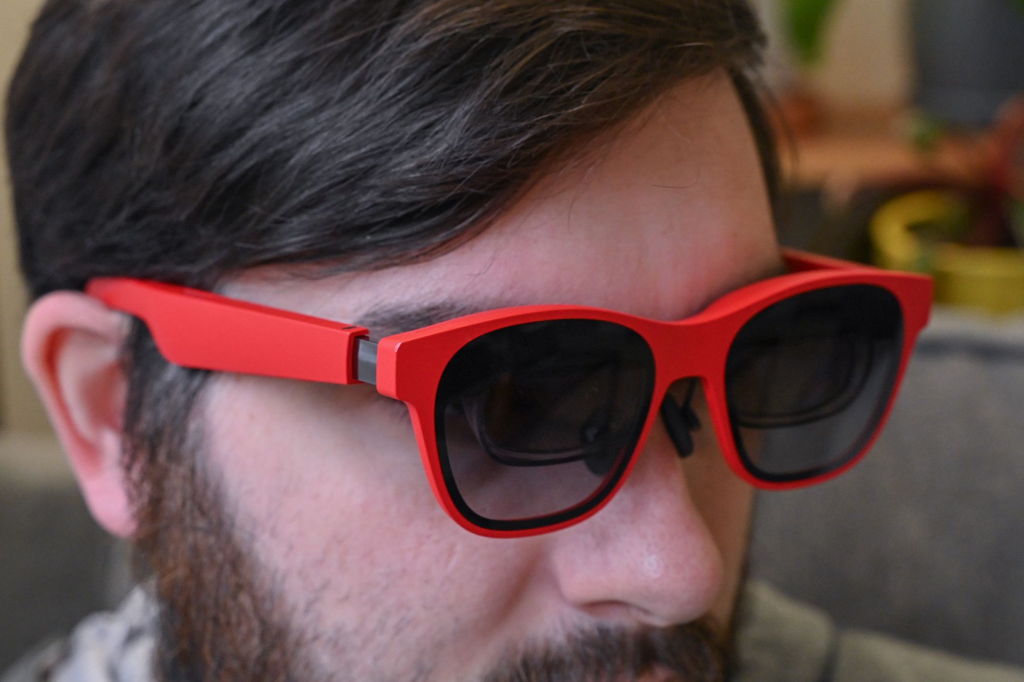 Person wearing a pair of XREAL Air 2 glasses