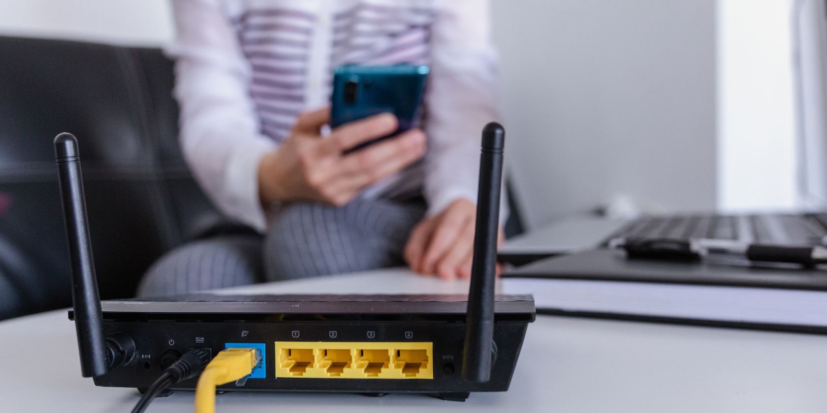 wifi router with person in the background