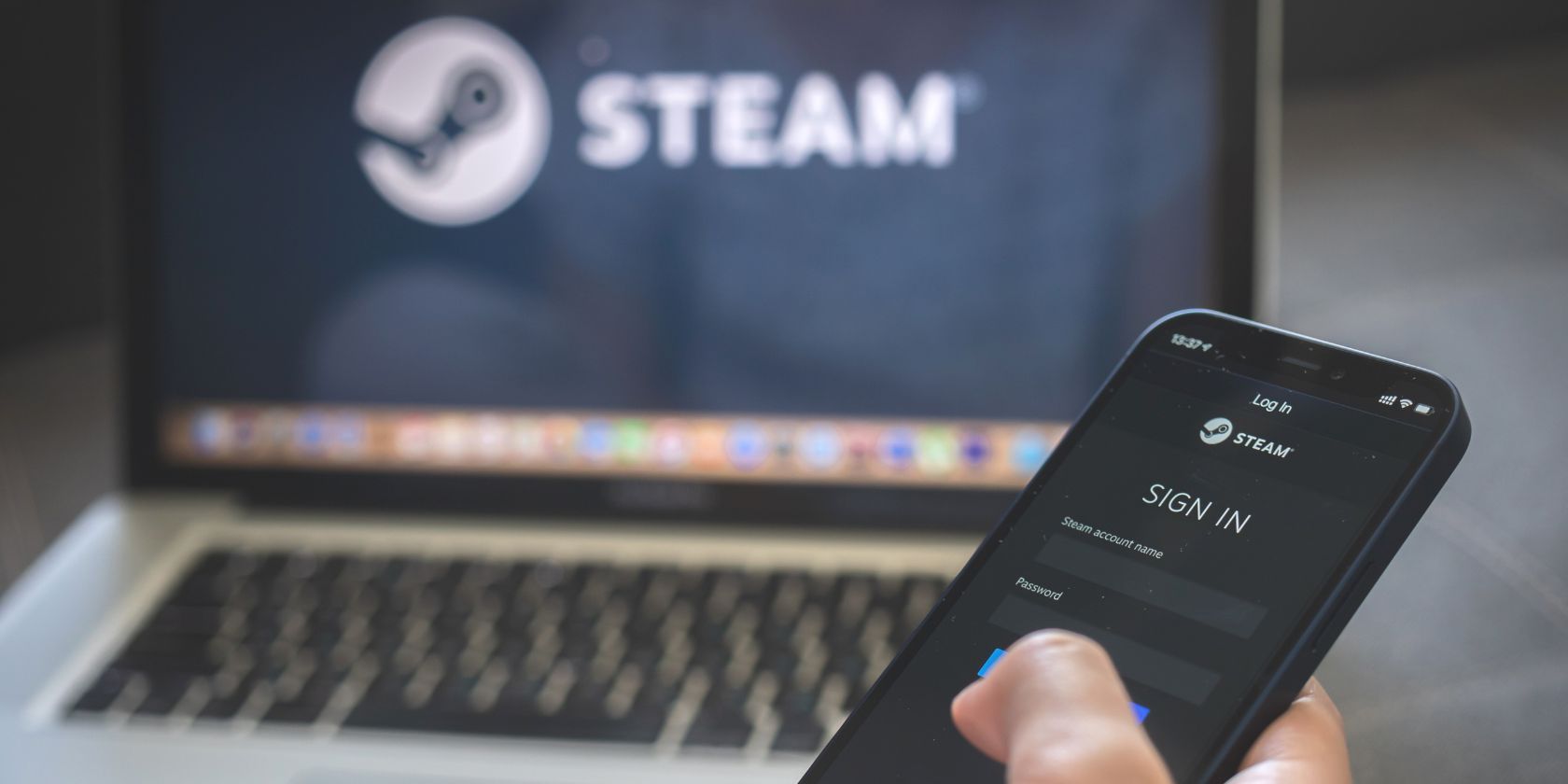 Woman using smartphone with steam app