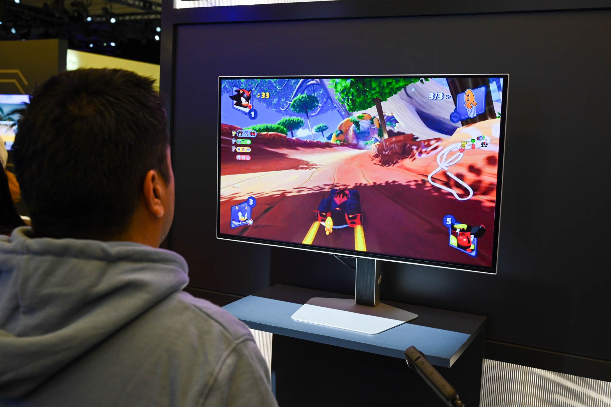 Person playing on the Odyssey OLED G8 32 Monitor at CES 2024