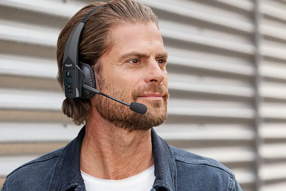 a man wears a blueparrot b350xt headset