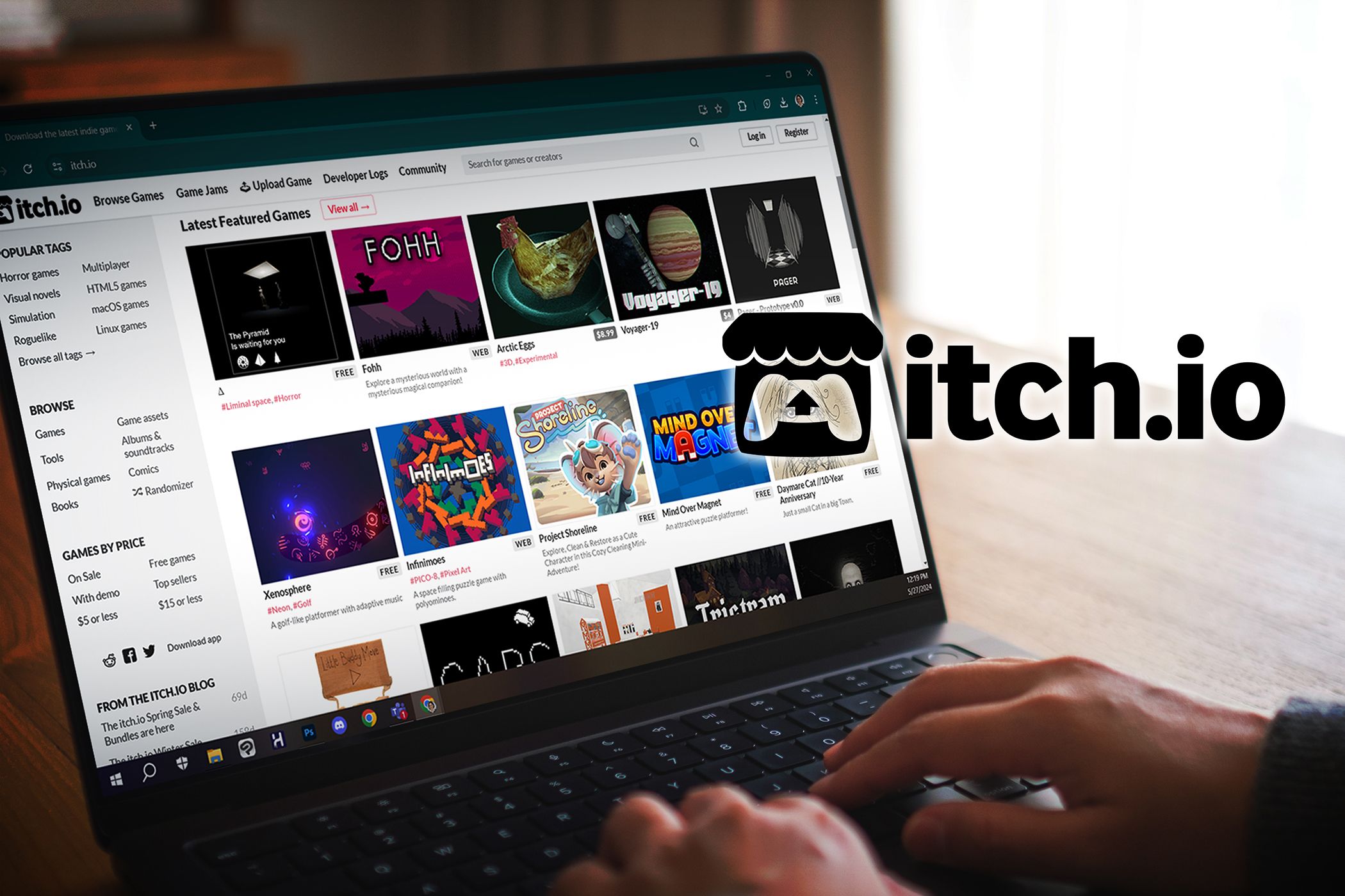 a person using itch.io on a laptop