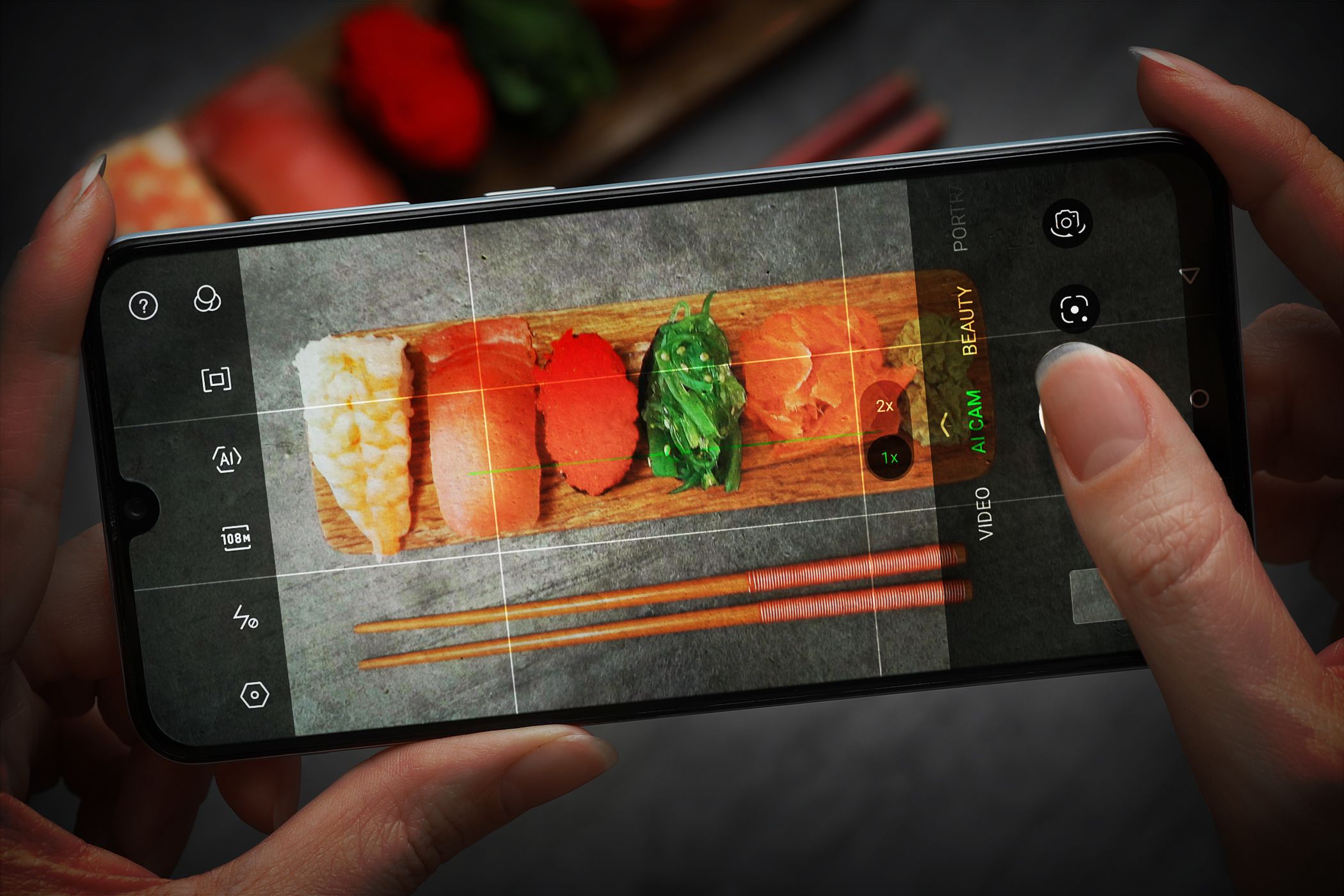 Person taking a close-up photo of sushi on a smartphone, highlighting the focus on food photography.