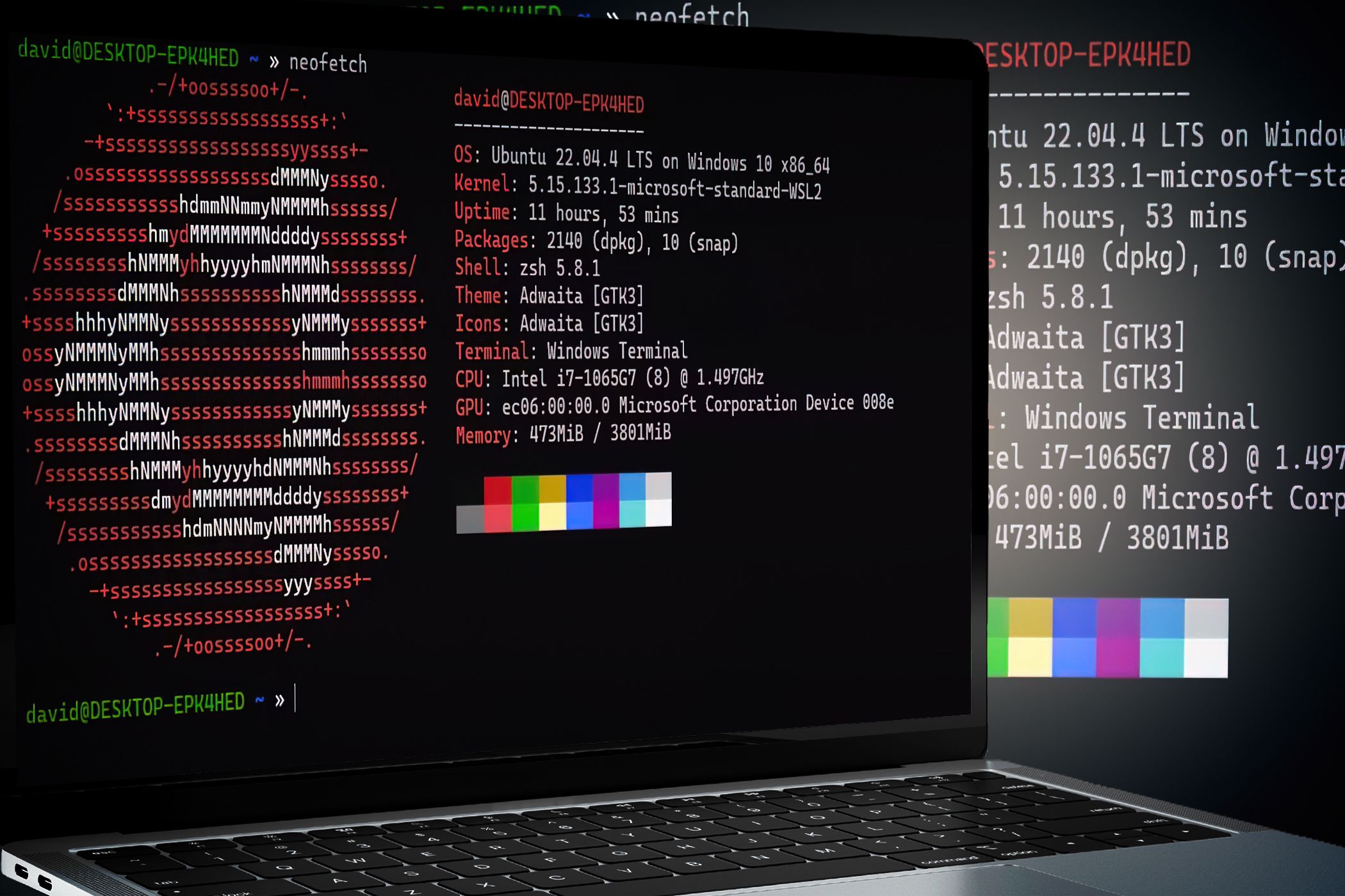 A laptop displaying Neofetch in a Linux terminal