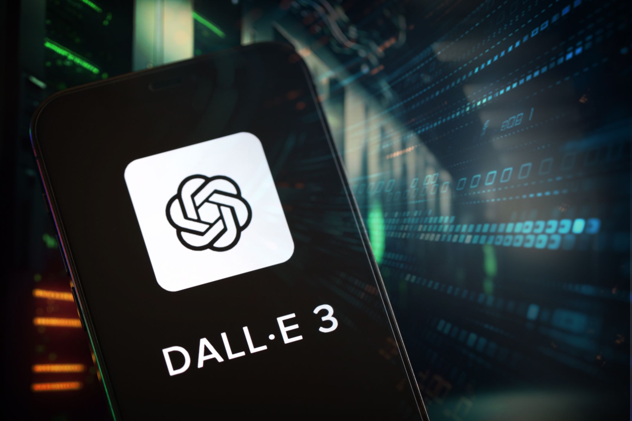 Smartphone displaying the DALL-E 3 logo, set against a background of data servers and digital code, symbolizing AI technology.