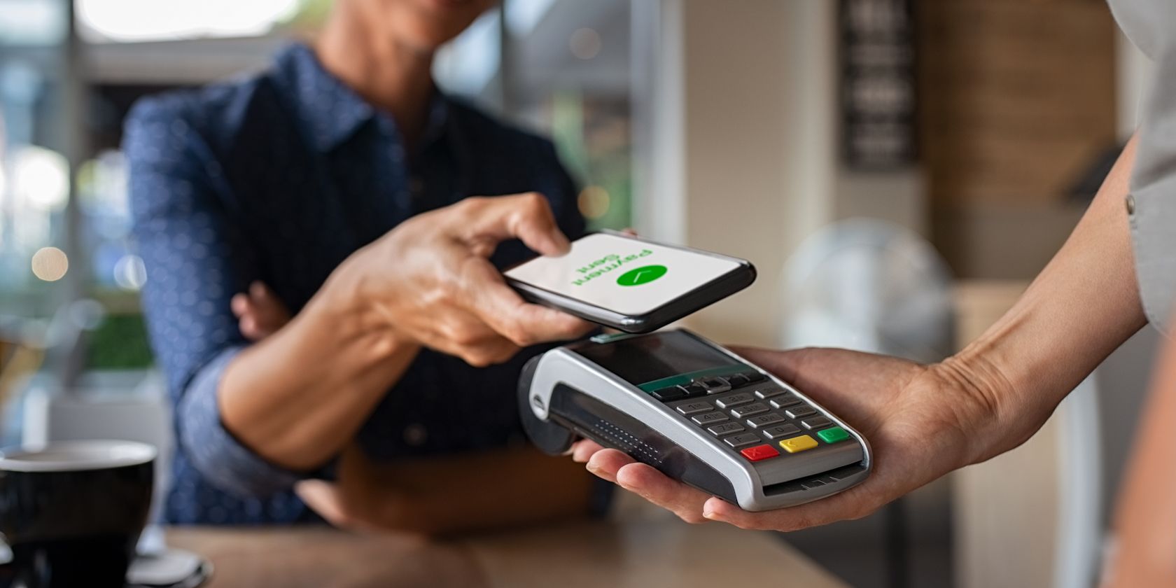 using nfc smartphone to pay in shop