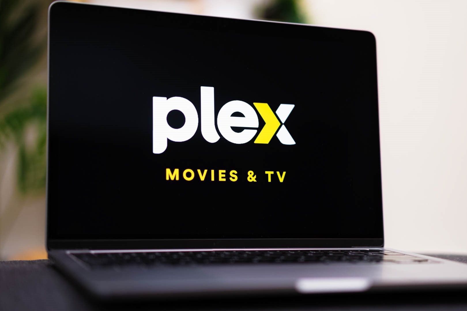 Plex logo on a laptop screen