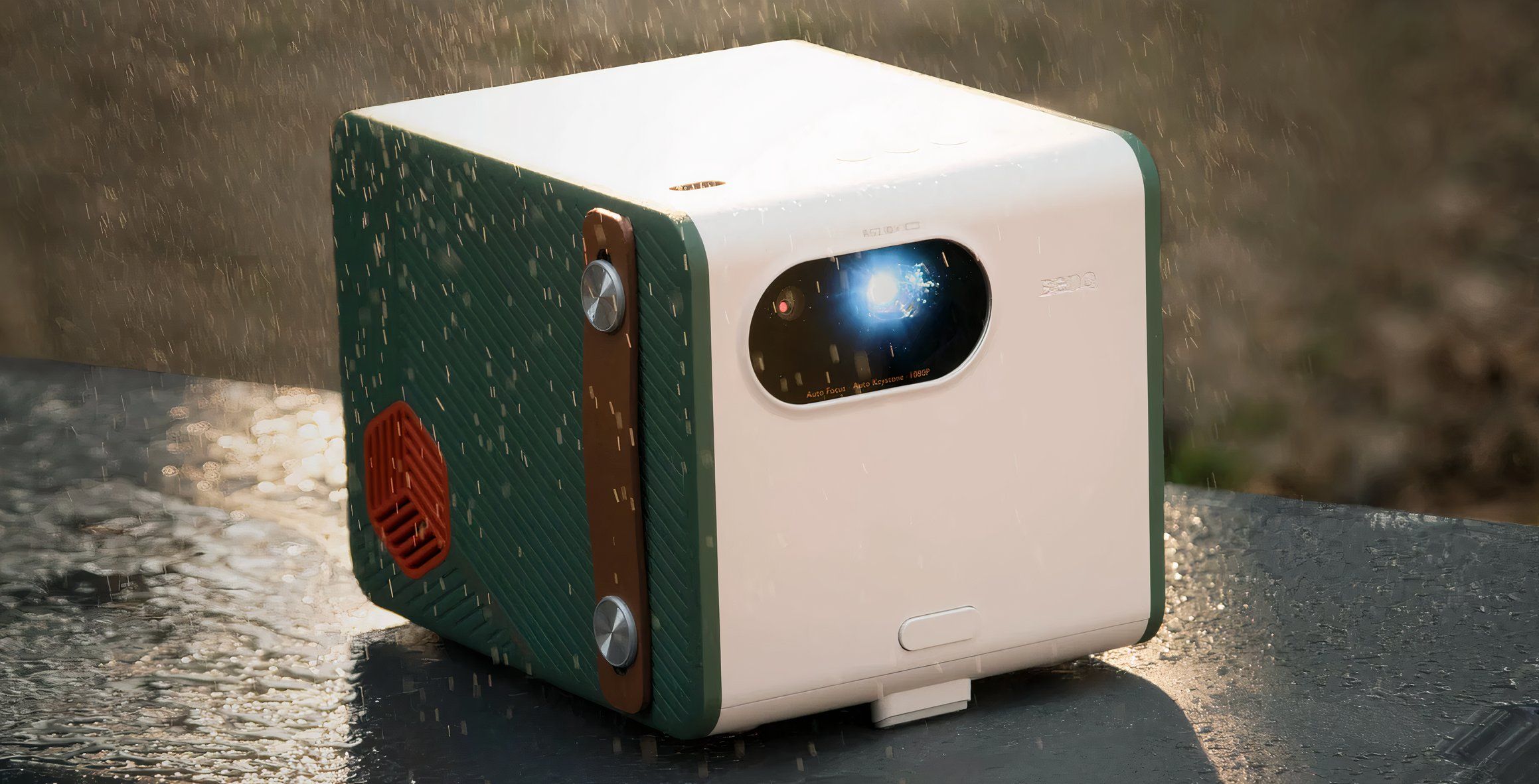 Product image of a BenQ outdoor projector withstanding a light rain